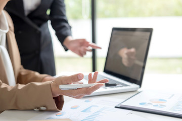 Business team meeting working with new startup project, discussion and analysis data the charts and graphs, calculator, laptop computer using, Business finances and accounting concept