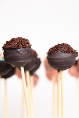 chocolate cake pops on white background