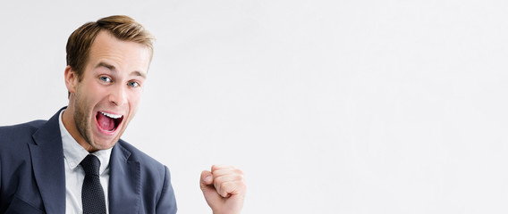 Very happy businessman, with copyspace