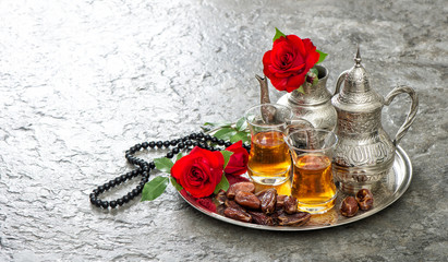 Tea table red rose flowers dates Islamic holidays decoration