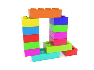 Letter Q concept built from toy bricks
