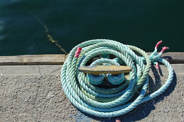 Fototapeta premium Blue coiled rope in the dock