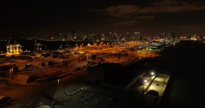 Night at a port 4k aerial video