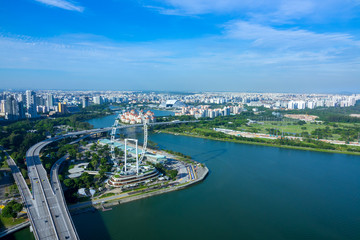 Naklejka premium Panorama of Singapore and Ferris Wheel. Aerial View