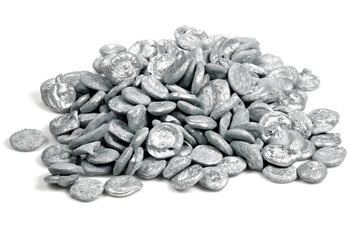 99.999% fine zinc pellets isolated on white background