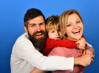 Man with beard, woman and son happy together