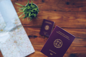 Naklejka premium Greek passports and map of Europe, top view
