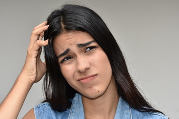 Fototapeta premium Confused Youthful Colombian Female