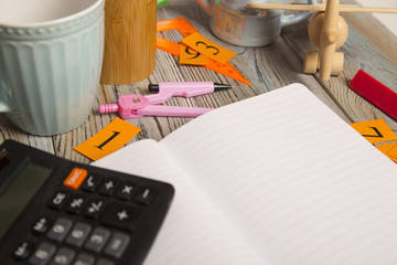 Stationery on grey wooden background