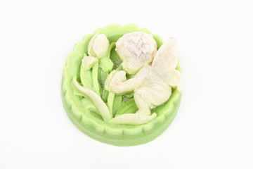 Handmade soap with the image of an angel isolated white background.