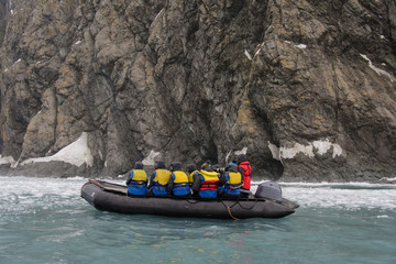 Inflatable boat with people © Alexey Seafarer