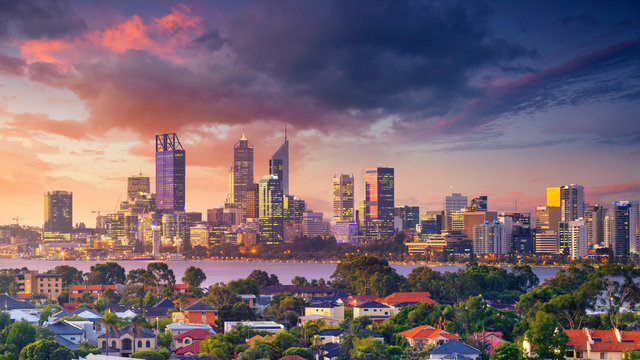 Perth. Panoramic aerial cityscape image of Perth skyline, Australia during dramatic sunset.