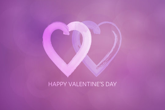 Valentine’s day. Two hearts and text: Happy Valentine’s Day
