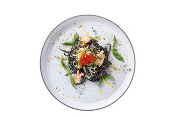 Original dish of black noodles on a white background.