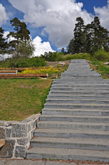 A park with a stone stairway to the horizon.
