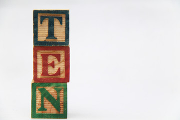 composing letters into one word, "Ten".