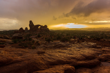 Fototapeta na wymiar Evening storm and beautiful cloudscape in the Arches National Park, Utah