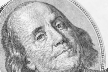 Benjamin Franklin portrait close-up on 100 dollars banknote