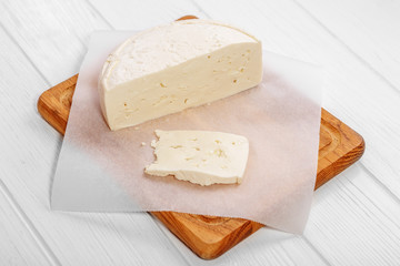 Homemade delicious cottage cheese. The concept is healthy food, restaurant, cafe, vegetarianism.