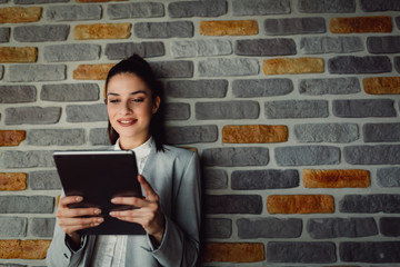 Businesswoman using tablet computer.