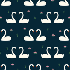 Trendy seamless pattern with white swans in love and water lily on dark blue background. Night lake art background. Fashion design for fabric, wallpaper, textile and decor.