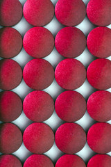 Red pills pattern close up