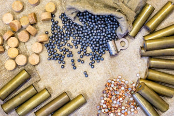 Brass liners rosyapyu together with a grape shot lie on the sacking