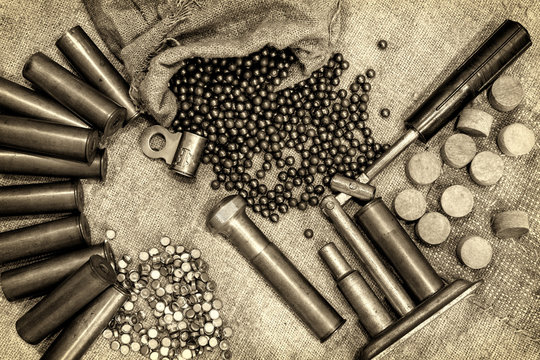 Brass liners rosyapyu together with a grape shot lie on the sacking