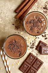 Chocolate banana smoothie with cinnamon.Top view .