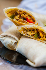 Closeup of the Interior of Shredded Chicken and Vegetable Burritos