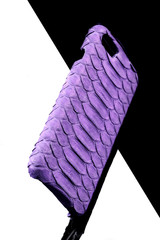 Exclusive ultraviolet snake leather case for smartphone.Luxury case. On black and white background