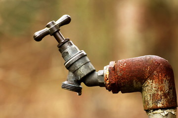 Dripping outdoor tap. - obrazy, fototapety, plakaty