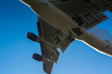 Horizontal View of Close Up of a Cargo Airplane in the Landing Operation in The Morning. Grottaglie, Taranto, South of Italy