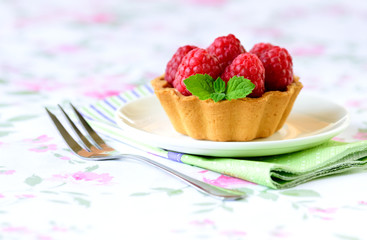 Mini tarts with raspberries fruits