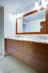 Sleek bathroom with double vanity cabinet