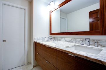 Sleek bathroom with double vanity cabinet