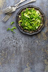 Frize lettuce salad, fresh frisee. Healthy vegetarian food