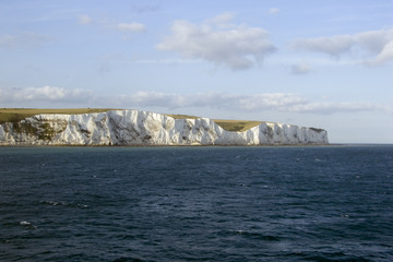 Europe, England. Kent, early morning sun on the White cliffs of Dover viewed from cross channel ferry