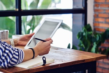 Coffee cup hot in the morning and working at cafe