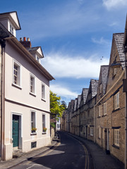 Quaint and historic buildings line the streets in the older parts of Cirencester, Gloucestershire, UK