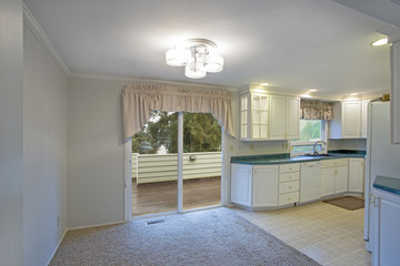 Light home interior with white kitchen cabinetry