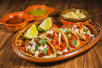 tacos al pastor and pineapple mexican food in mexico city 