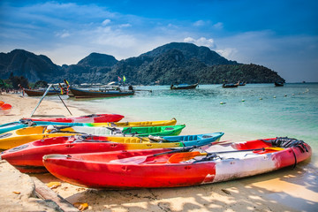 Colorful kayaks at Ao Loh Dalum beach on Phi Phi Don Island Krabi Province Thailand.