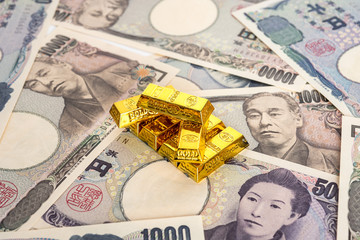 日本円と金塊のイメージ