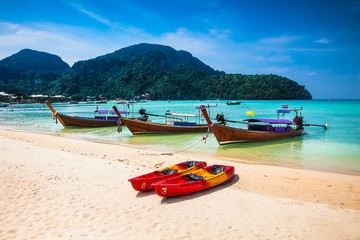 Longtail boats anchored at Ao Loh Dalum beach on Phi Phi Don Island .Thailand.