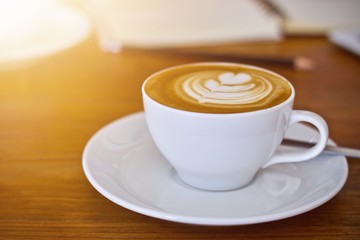 Coffee cup hot in the morning and working at cafe