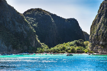 Boats at Maya beach in Ko Phi Phi island, Thailand.