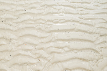 wet sand at beach coastline texture background.wave form.