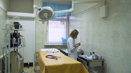 Anesthesiologist, operating room with medical equipment in a veterinary clinic. Table for surgical operations in the hospital.