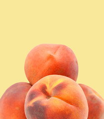 Ripe peach fruit isolated on yellow background cutout